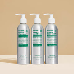 A set of refillable and eco-friendly bottles full of Umanos marine greens shampoo, body wash and conditioner. All natural ingredients in sustainable bottles.